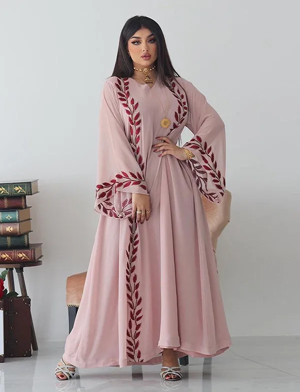 Robe longue musulmane en mousseline brodée rose à col rond