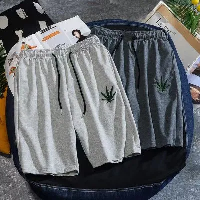 Short en tissu pour homme avec feuille cannabis décorative